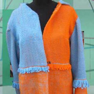 Producción 2011 - Abrigo tejido en telar de cuadro Producción 2011 - Abrigo tejido en telar de cuadro